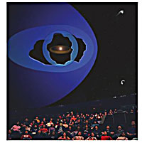 An audience watches the IBEX: Search for the Edge of the Solar System planetarium show at the Adler Planetarium, Chicago, IL.